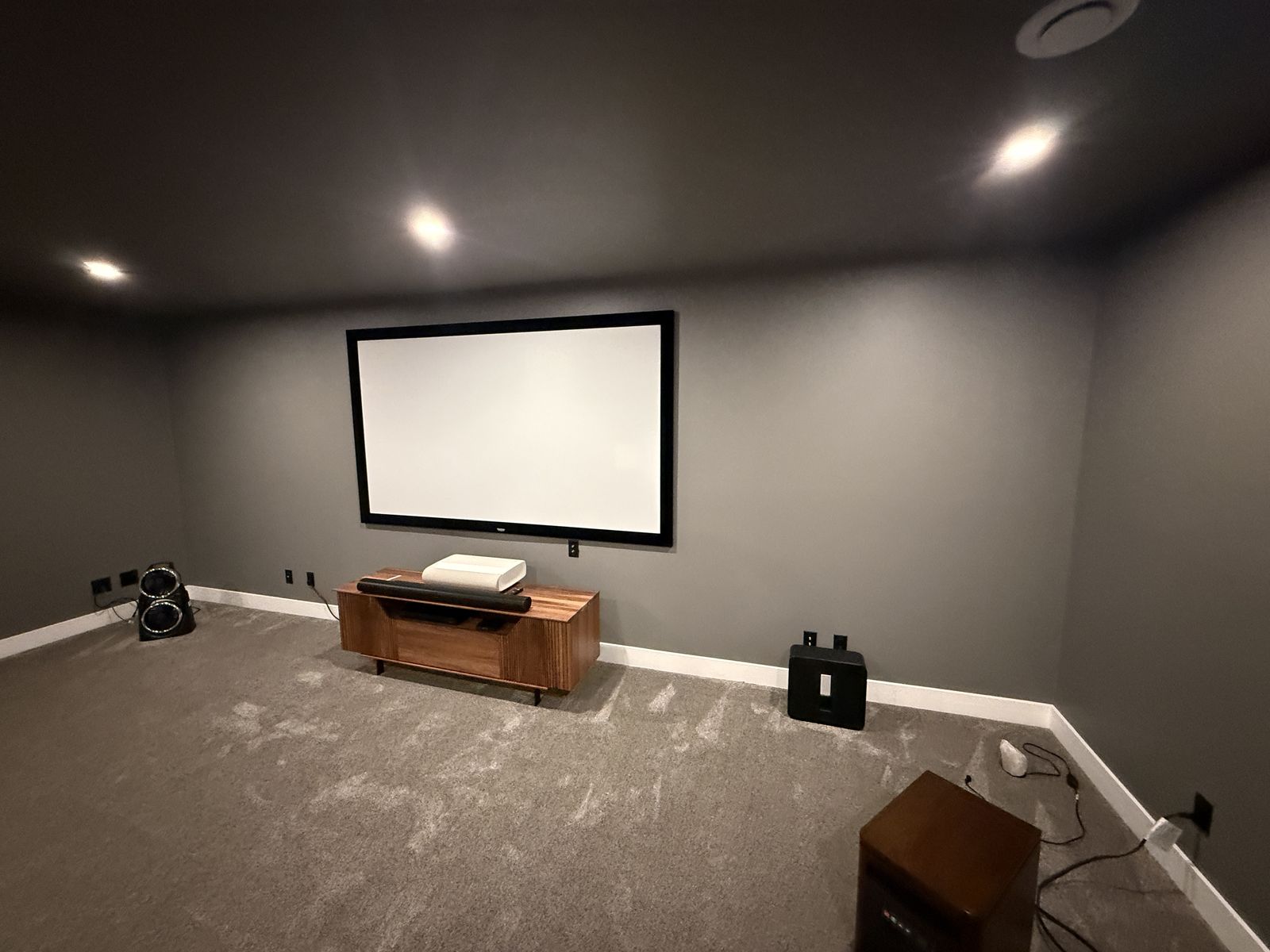 Theatre before Slat Studio feature wall